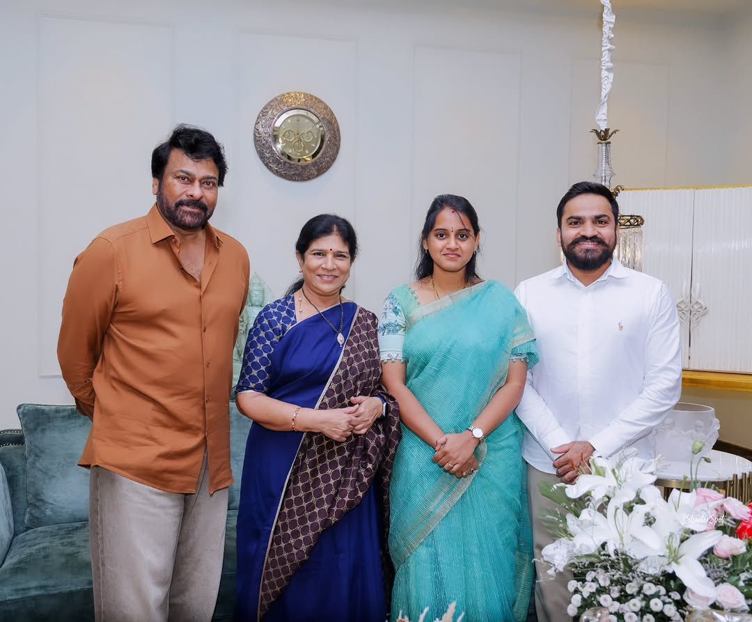 Megastar Chiranjeevi and Smt. Surekha standing with Tejaswi and Sandeep Bhaga at their home